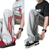 Pantalones deportivos de retazos a rayas estilo retro americano de seda helada de secado rápido, pantalones rectos holgados de moda de alta costura, pantalones casuales para adolescentes