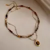 Elegante Collar con Colgante de Ojo de Tigre con Cuentas Maillard Apilado de Doble Capa para Otoño e Invierno Retro Elegante Celebridad de Internet Cadena de Lana