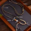 Cuerda de collar tejida a mano retro de Xizang, cuerda de borla de colgante de thangka de jade Hetian de cera de abeja, cuerda de joyería para mujer y hombre, venta al por mayor