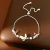 Pulseira de Concha com Borboleta Cravejada de Zircônia e Pérola, Toque de Luxo Leve e Alto Padrão, Joias Elegantes e Frescas com Estilo Doce para Atacado