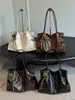 Bolsa grande retrô casual transfronteiriça para mulheres, nova bolsa tote casual para o dia a dia, bolsa de ombro de grande capacidade moderna para o trabalho