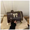 Bolso de Moda Estilo Coreano para Mujer 2026 Nuevo Modelo Simple Color Sólido Bolso Cuadrado Pequeño de Viaje Elegante Bolso Cruzado con Cadena