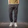 Pantalones para trabajo hombres usan resistentes a la abrasión trabajadores de la construcción ropa de trabajo holgados otoño talla grande pantalones para trabajo pantalones de protección laboral
