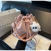 Bolso de lona popular de este año para mujer, otoño e invierno 2024, nueva moda, bolso de tela colgante, bolso de cubo portátil de nicho