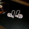 Pendientes de corazón hueco con circonitas y diamantes engastados con agujas de plata para mujer, diseño exagerado europeo y americano, pendientes de temperamento con brillo, joyería al por mayor