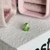 Colección de Brazaletes de Oreja Verde Fresco de Primavera: Aretes de Acero de Titanio Color Verde Menta Transparente con Aretes de Trébol de Cuatro Hojas Microincrustados