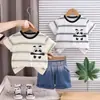 Conjunto de Verano para Niños 2026 Estilo Nuevo para Niños de Moda Bolsillo de Dibujos Animados Manga Corta Bebé Deportivo Conjunto de Dos Piezas Venta al por Mayor