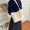 Bolso de mano tipo cesta para verduras con patrón tejido, bolso de hombro de mujer moderno de gran capacidad, nuevo modelo 2026, bolso tipo cubo retro simple