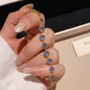 ¡Esmeralda Azul y Brillo Dorado! Pulsera de Zirconia Redonda Electrochapada en Oro Real de 18K, Pulsera de Estilo Vintage Francés, Joyería de Alta Gama para Mujeres