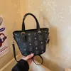 Bolso tipo cubo bolso de mano pequeño para mujer, nuevo bolso tote tipo cesta de verano 2026 con textura, bolso de hombro versátil
