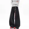 Calça casual de outono da marca da moda, com caimento solto, cintura torcida com corrente, retalhos fluidos, desconstruída, para homens, calça de perna larga estilo americano, legal e estilosa
