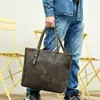 Bolso de hombro de moda simple europeo y americano bolso de mano retro neutro de cuero genuino bolso tote de cuero de caballo loco de gran capacidad al por mayor