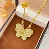 Colgante de Flor de Peonía Dorada Retro con Collar de Hueso de Serpiente y Colgante de Mariposa Roja con Pedrería Joyería de Lujo Ligero Estilo Chino