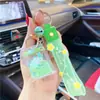 Celebridad de internet ins aceite líquido caja de leche de unicornio botella flotante llavero colgante para mochila escolar de estudiante colgante de bajo flujo