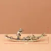 Ornamento de cormorão e jangada de bambu em latão puro para mesa de casa e escritório, pequena peça decorativa, artesanato em latão apresentando um cormorão idoso e jangada de bambu