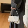 2026 Nuevo Bolso de Mujer Plegado de Moda Transfronterizo Elegante Bolso de Hombro con Cadena de Perlas con Patrón de PU