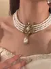 Colar de Pérolas em Camadas Estilo Barroco de Corte, Luxo Leve, Acabamento Sofisticado, Corrente Elegante e Clássica para Clavícula, Envio em até 7 Dias