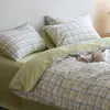 Juego de cuatro piezas de algodón puro a rayas estilo japonés, juego de sábanas y fundas de edredón 100% algodón modelo nuevo 2026, juego de tres piezas para ropa de cama de dormitorio estudiantil