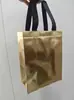 Bolsa de mano de tela no tejida con película láser plegable protección ambiental embalaje regalo publicitario bolsa de compras promocional venta al por mayor impresión de logotipo
