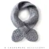 Nueva colección de otoño e invierno: Buff de cachemir de punto liso y versátil con diseño cruzado y ojales, perfecto para usar en capas y proteger tu cuello.