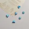 Cuentas de acrílico con acabado lechoso de flor de lirio del valle con agujero recto al por mayor, materiales y accesorios para cadenas de teléfono y llaveros DIY