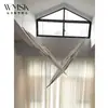 Luminária pendente longa de luxo estilo nórdico, um design novo e sofisticado com uma estética minimalista e artística, adequada para restaurantes e bares, apresentando uma cor creme vintage