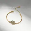 Pulseira de Aço Inoxidável Flor de Cinco Folhas com Zircônia Liga Eletrodepositada 18K com Strass Pulseira da Moda para Celebridade da Internet Pulseira Versátil Personalizada
