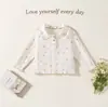 Camiseta básica de manga larga para niña para primavera y otoño, con estampado de estrellas de colores y cuello tipo muñeca, top para bebé con volantes en el borde