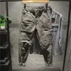 Calças casuais Taitao Retro americano Costura personalizada Macacão moderno Marca de moda masculina Com laço no tornozelo Slim fit Calças casuais versáteis