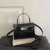 Otoño/Invierno 2026 Nuevo Elegante Textura de Moda Versátil Ligero de Lujo con Relieve de Cocodrilo Bolso Kelly de Hombro Cruzado de Mano