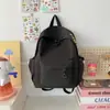 Nova mochila de grande capacidade para alunas do ensino fundamental, moderna e versátil, mochila de design estilo japonês para estudantes do ensino médio e universitários