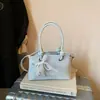 Bolso de mano para mujer 2026 nuevo modelo gran capacidad axila casual bandolera de hombro de mano bandolera tipo cubo