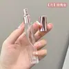 En stock venta al por mayor botella de perfume cilíndrica de vidrio de 10 ml botella para decantar portátil de viaje botella rociadora cosmética
