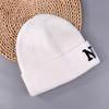 Gorro de punto con vuelta para mujer, gorro de lana informal con bordado de letras, cálido, protector solar y frío, para otoño e invierno, nuevo