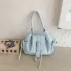 Comercio exterior transfronterizo estilo coreano bolsa de axila de moda con cordón y lazo para mujer 2026 nueva tendencia casual bolsa de hombro cruzada