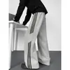 Pantalones de estilo americano con patrón de escamas de dragón en bloques de color para hombre, pantalones deportivos casuales de pierna recta para otoño, pantalones holgados de pierna ancha, modernos y elegantes