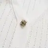 Nueva familia SP primavera y verano para mujer, estilo francés, fragancia pequeña, alta gama, cuello en V, temperamento, hueco, hebilla de taladro, cintura, vestido de punto