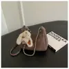Bolso bandolera casual de diseño de nicho de gran capacidad transfronterizo nuevo 2026 para mujer, bolso de hombro tipo tote con cadena para ir al trabajo