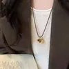 Pendientes de Moda Retro Maillard Estilo Hong Kong con un Toque Lujoso y de Alta Gama, Pendientes Colgantes y Conjunto de Collar con Piedra Ojo de Tigre