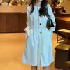 Vestido camisa simples para mulheres, com gola redonda, de abotoamento simples, mangas compridas, cintura marcada, detalhe de amarração, comprimento médio e bolsos, perfeito para um look chique e profissional