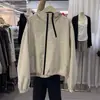 Chamarra Corta con Capucha Estilo Coreano Doble Cierre para Mujer Otoño 2026 Holgada Casual Dobladillo con Cordón Chaqueta Cargo Top