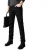 Jeans negros de alta gama para hombre en otoño e invierno, corte slim, pierna recta, business casual, elásticos, modernos, versátiles y forrados de polar