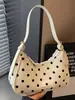 Bolso único de lunares estilo coreano para axila para mujer, nuevo bolso de hombro de nicho para el verano de 2026, bolso de mano retro francés, bolso tipo dumpling
