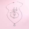 Conjunto de 4 piezas de joyería transfronteriza de moda europea y americana con diamantes de imitación de Joker, disponible al por mayor.