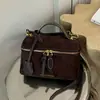 Bolsa de camurça de nicho para mulheres, nova bolsa versátil outono 2026 vintage, bolsa de mão e bolsa transversal, bolsa caixa de alta qualidade