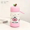 Mini taza térmica de dibujos animados con temática de manzana, una botella de agua linda y elegante para niñas, portátil y compacta, perfecta para llevar de viaje.