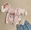 Nova camisa de verão estilo coreano com bordado de cata-vento, manga curta, gola redonda popular, corte justo, top versátil para mulheres