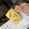 Mini Bolsa Kelly em Amarelo Frango Couro Genuíno para Mulheres, Bolsa Versátil com um Novo Toque de Luxo, Bolsa de Mão, Ombro e Transversal, Atacado do Fabricante