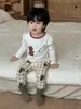Conjunto de ropa de casa para bebé, conjunto de otoño para niños, conjunto de dos piezas de top y pantalones de otoño, nuevo estilo 2026, ropa interior sin costuras de grado A para niños