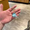 Chaveiro de acrílico transparente com areia movediça de desenho animado, pingente de bolsa, pequeno presente para crianças, decoração de carro